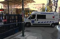 An ambulance pulls into a hospital in Athens