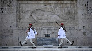 Presidential Guards perform a shift change at the Tomb of the Unknown Soldier, in Athens
