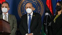 French Foreign Affairs Minister Jean-Yves Le Drian, and Libyan Foreign Minister, Najla el-Mangoush, take the stage, in Tripoli, Libya, Thursday, March 25, 2021
