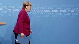German Chancellor Angela Merkel leaves after a news conference at the CDU at the headquarters in Berlin, Germany. Oct. 29, 2018.
