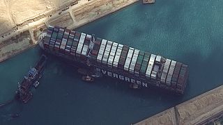 This satellite image from Maxar Technologies shows the cargo ship MV Ever Given stuck in the Suez Canal near Suez, Egypt, Friday, March 26, 2021.