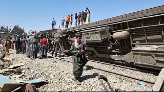 Egypt buries first victims of rail disaster as train traffic resumes