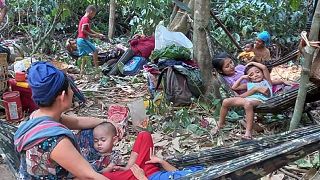 Karen villagers gather in the forests as they hide from military airstrikes in the Deh Bu Noh area of the Papun district, north Karen state, Myanmar, Sunday, March 28, 2021.