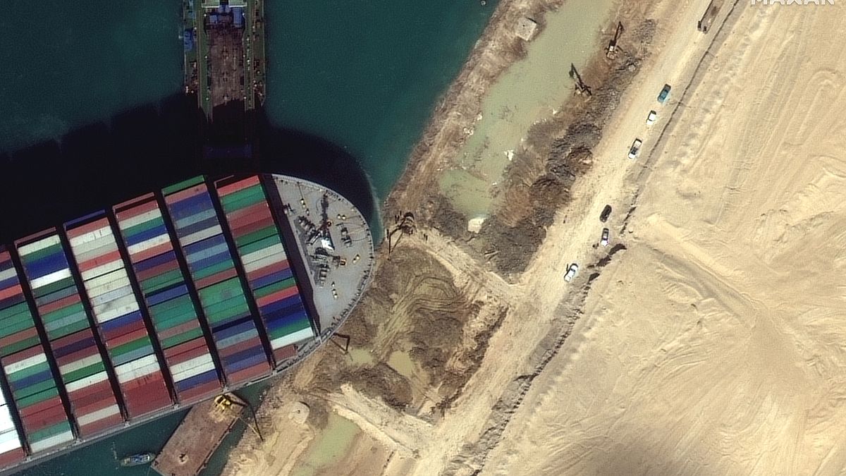 This satellite image from Maxar Technologies shows the cargo ship MV Ever Given stuck in the Suez Canal near Suez, Egypt, Saturday, March 27, 2021.