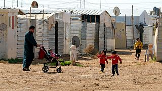 Syrian children play in the Zaatari refugee camp in Jordan