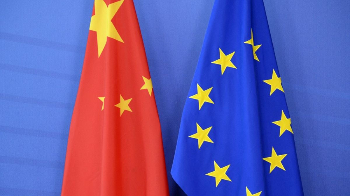 China's flag beside the European Union flag during an EU-China Summit 
