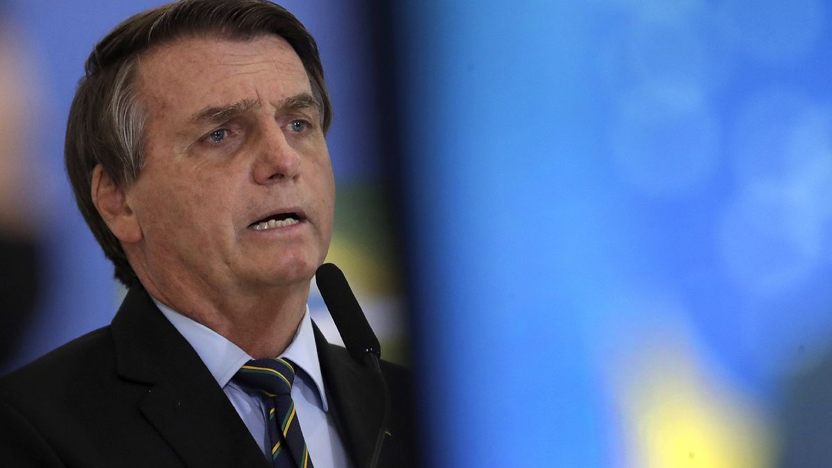 Brazil's President Jair Bolsonaro speaks at a ceremony announcing economic measures to support philanthropic hospitals and help them treat COVID-19 patients.