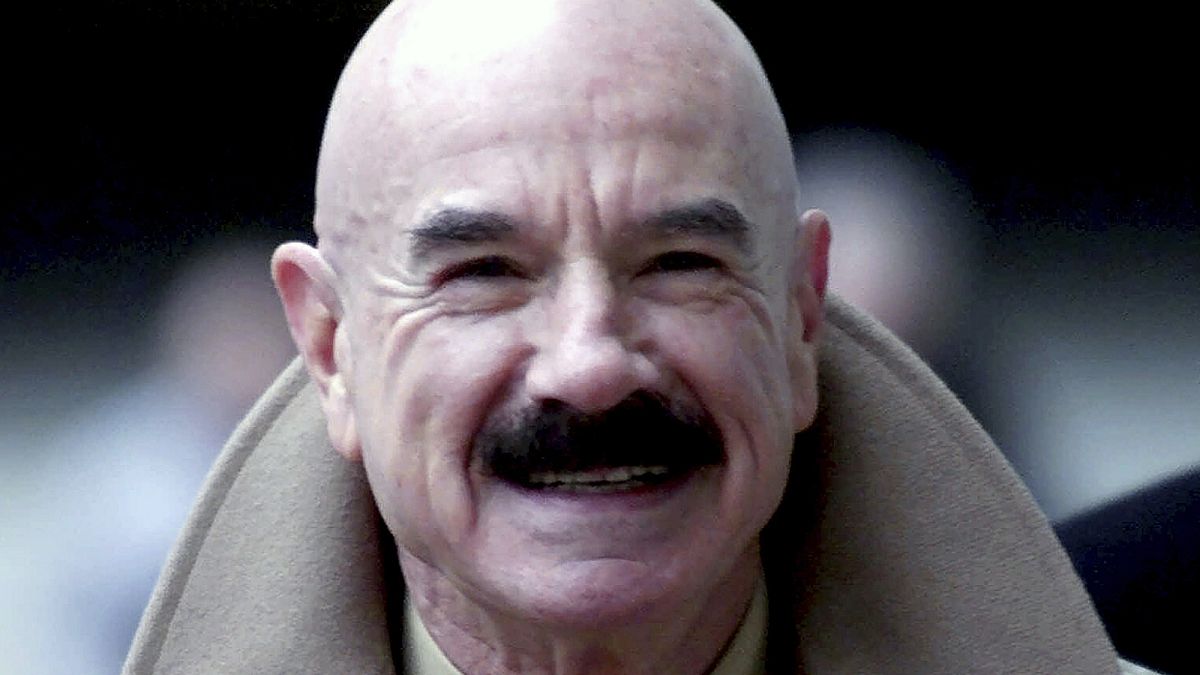  This Jan. 16, 2001, file photo shows G. Gordon Liddy, a Watergate conspirator, arriving at Baltimore's federal courthouse. 