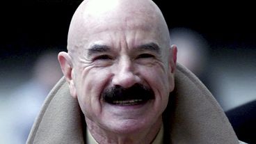  This Jan. 16, 2001, file photo shows G. Gordon Liddy, a Watergate conspirator, arriving at Baltimore's federal courthouse. 