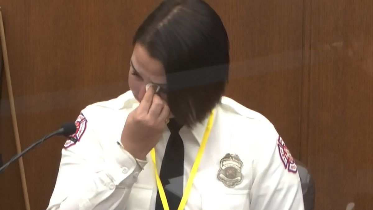 In this image from video, Minneapolis Firefighter Genevieve Hansen, wipes her eyes as she testifies on March 30, 2021.