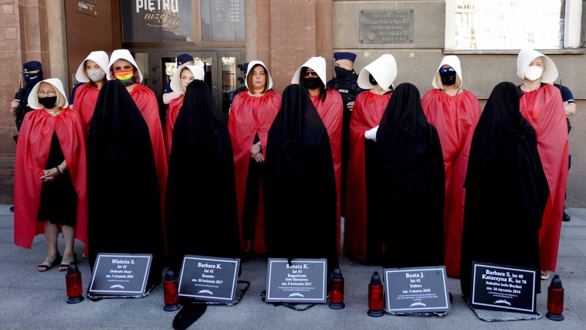 FILE photo from July 24, 2020, women dressed to evoke the feminist dystopian story "The Handmaid's Tale" 