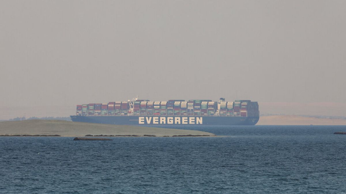 FILE: Ever Given, a Panama-flagged cargo ship, is seen in Egypt's Great Bitter Lake Tuesday, March 30, 2021. 