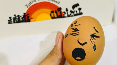 egg decorated with a design in support of protesters demonstrating against the military coup in Myanmar