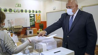 Bulgarian Prime Minister Boyko Borissov casts his ballot during parliamentary elections in the town of Bankya, Bulgaria, Sunday, April 4, 2021.