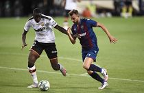 FILE PHOTO: Valencia's French defender Mouctar Diakhaby (L) vies with Levante's Spanish forward Borja Mayoral during A Spanish League football match, June 12, 2020.