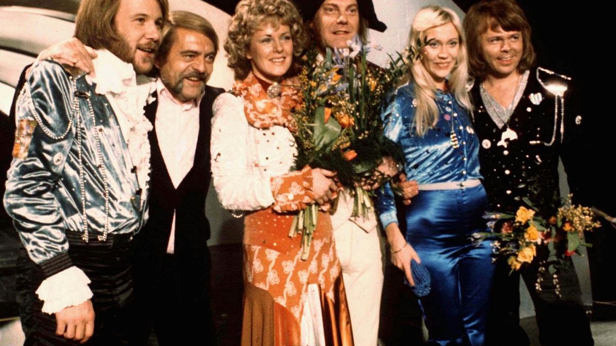 In this April 6, 1974 file photo, members of Swedish group ABBA and close associates celebrate the victory of their song "Waterloo" in the Eurovision Song Contest in Brighton