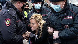 Police officers detain the Alliance of Doctors union's leader Anastasia Vasilyeva at the prison colony IK-2