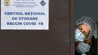 Medical staff at the National Center for Storage of the COVID-19 Vaccine, a military run facility, in Bucharest, Romania in December 2020.