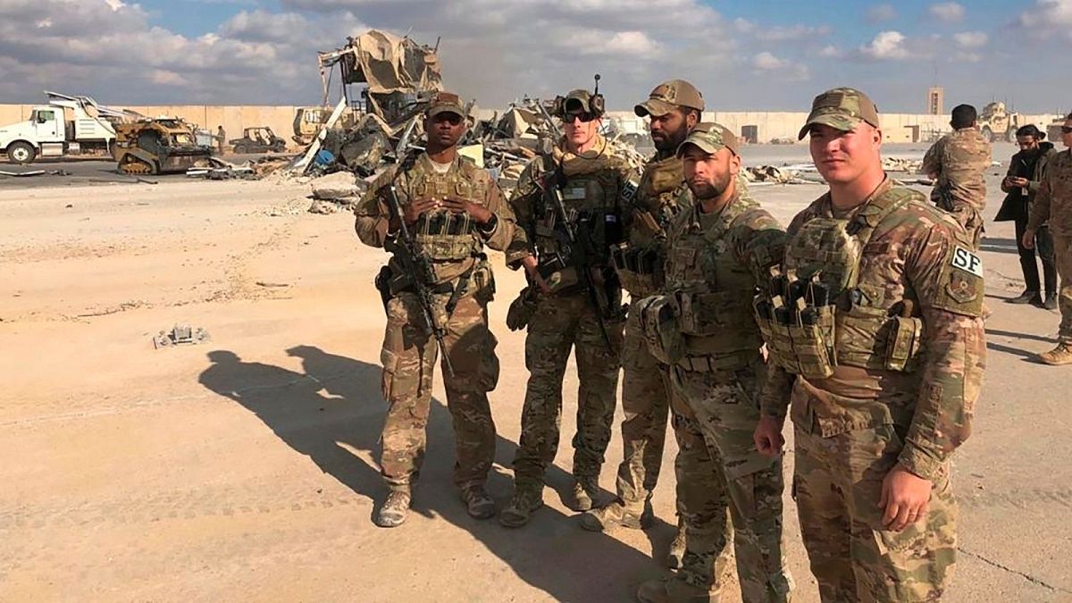 U.S. Soldiers stand at Ain al-Asad air base, Iraq