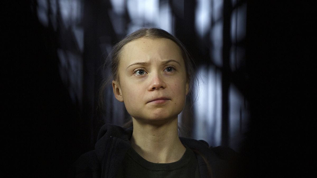 Swedish climate activist Greta Thunberg speaks with the media as she arrives for a meeting of the Environment Council at the European Council building in Brussels, March 2020.