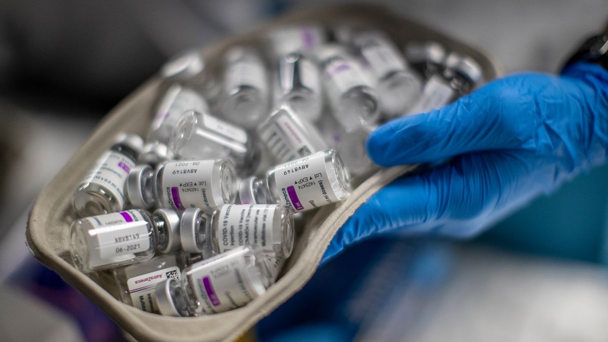 A nurse holds vials of AstraZeneca vaccine against COVID-19 during a vaccination campaign at WiZink indoor arena in Madrid, Spain, April 9, 2021.