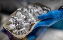 A nurse holds vials of AstraZeneca vaccine against COVID-19 during a vaccination campaign at WiZink indoor arena in Madrid, Spain, April 9, 2021.