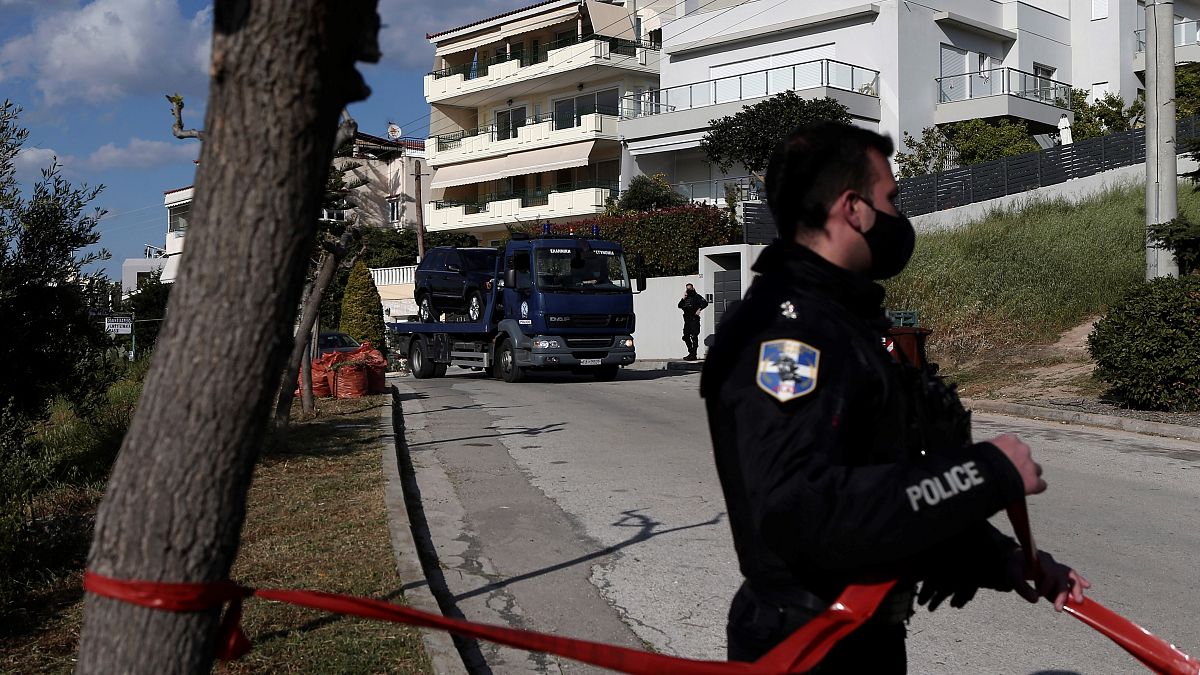 Police outside the home of Giorgos Karaivaz, a crime journalist who was shot dead