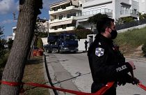 Police outside the home of Giorgos Karaivaz, a crime journalist who was shot dead