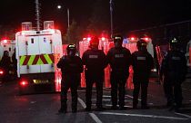 Police form a line to separate Nationalists from attacking each other in North Belfast, Northern Ireland, April 9, 2021. 
