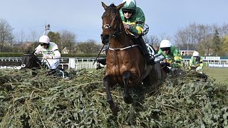 Rachael Blackmore riding Minella Times wins the Randox Grand National Handicap Chase. Aintree racecourse, near Liverpool, England. April 10, 2021.