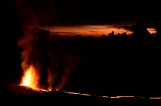 Lava projection on Piton de la Fournaise volcano, by night