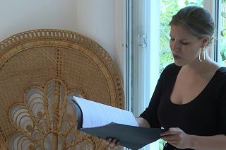 Fiona McGown singing in the sitting room