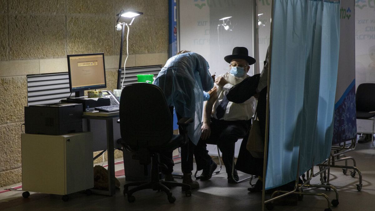 FILE: an ultra-Orthodox Jewish man receives a Pfizer-vaccine in Jerusalem, Jan. 7, 2021.