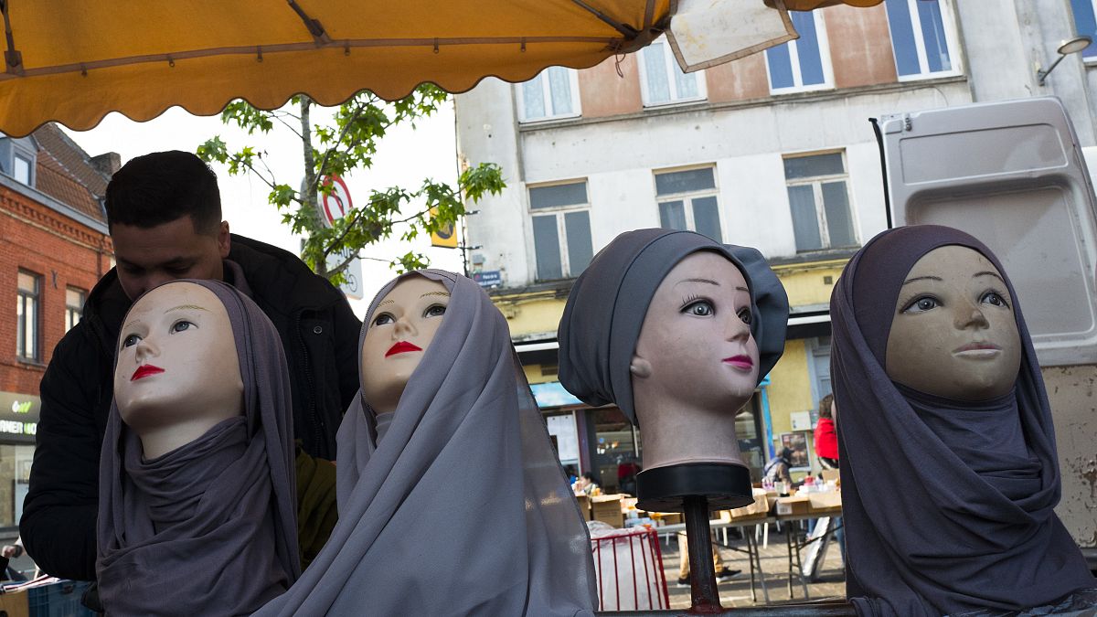 Mannequins present Muslim veils at an open air market in Lille.