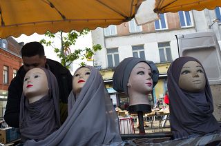 Mannequins present Muslim veils at an open air market in Lille.