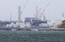 Fukushima Daiichi nuclear power plant is seen from Namie town, Fukushima prefecture, north of Tokyo, Tuesday, April 13, 2021. 