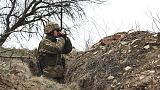 A Ukrainian soldier is seen at fighting positions on the line of separation from pro-Russian rebels near Donetsk, Ukraine, Monday, April 12, 2021. 