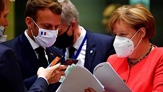 France's Macron and Germany's Merkel during an EU summit to agree on a COVID recovery fund