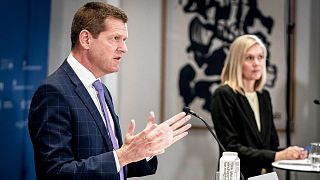 Soeren Brostroem, director of the National Board of Health, left and Tanja Erichsen, from the Danish Medicines Agency take part in a press briefing 