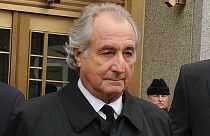 Bernard Madoff exits Manhattan federal court on Tuesday, March 10, 2009, in New York. The disgraced financier has died in a US federal prison.