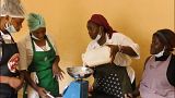 Fatoumata is weighing flour at a baking class in Conakry, Guinea.