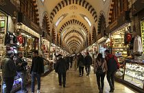 Shoppers browse stalls at Istanbul's Egyptian bazaar.