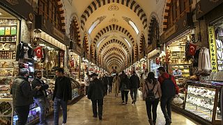 Shoppers browse stalls at Istanbul's Egyptian bazaar.