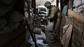 Ukrainian servicemen keep a position on the frontline with Russia-backed separatists near Gorlivka, Donetsk region