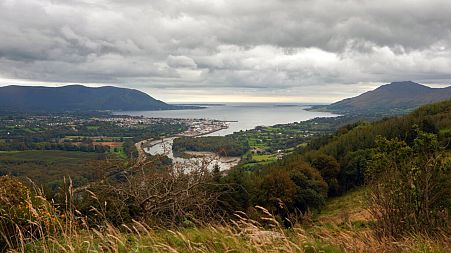Warrenpoint village in the UK, whose ferry connects Northern Ireland, left, with the Republic of Ireland, right.