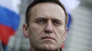 FILE - In this file photo taken on Feb. 29, 2020, Russian opposition activist Alexei Navalny takes part in a march in memory of opposition leader Boris Nemtsov in Moscow.