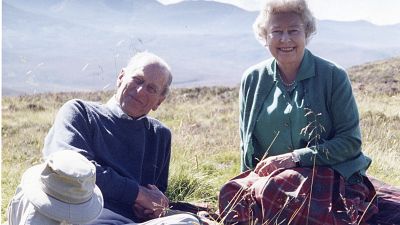 In this 2003 photo released by Buckingham Palace on April 16, 2021, a personal photograph of Queen Elizabeth II and Prince Philip Duke of Edinburgh in Scotland.