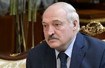 Belarusian President Alexander Lukashenko listens to Russian Prime Minister Mikhail Mishustin during their talks in Minsk, Belarus, April 16, 2021. 