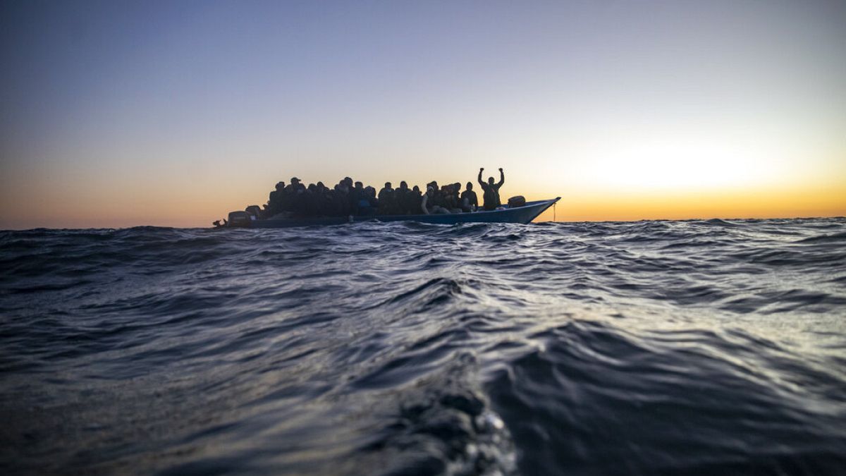 Archives / Des migrants africains attendent l'aide de l'ONG espagnole Open Arms, le 12 février 2021, en mer méditerranée, au large de la Libye