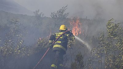 A fire rages on the slopes of Table Mountain, in Cape Town South Africa.